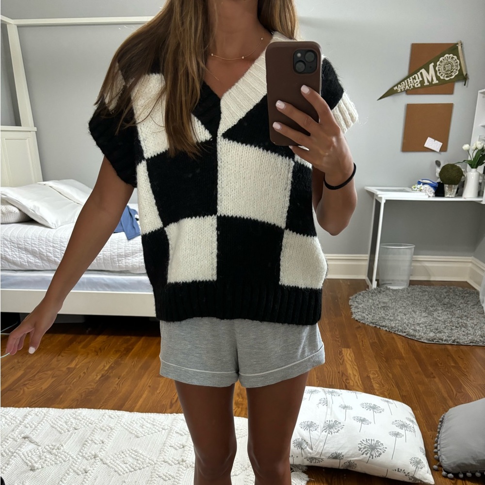 Black and white sweater vest